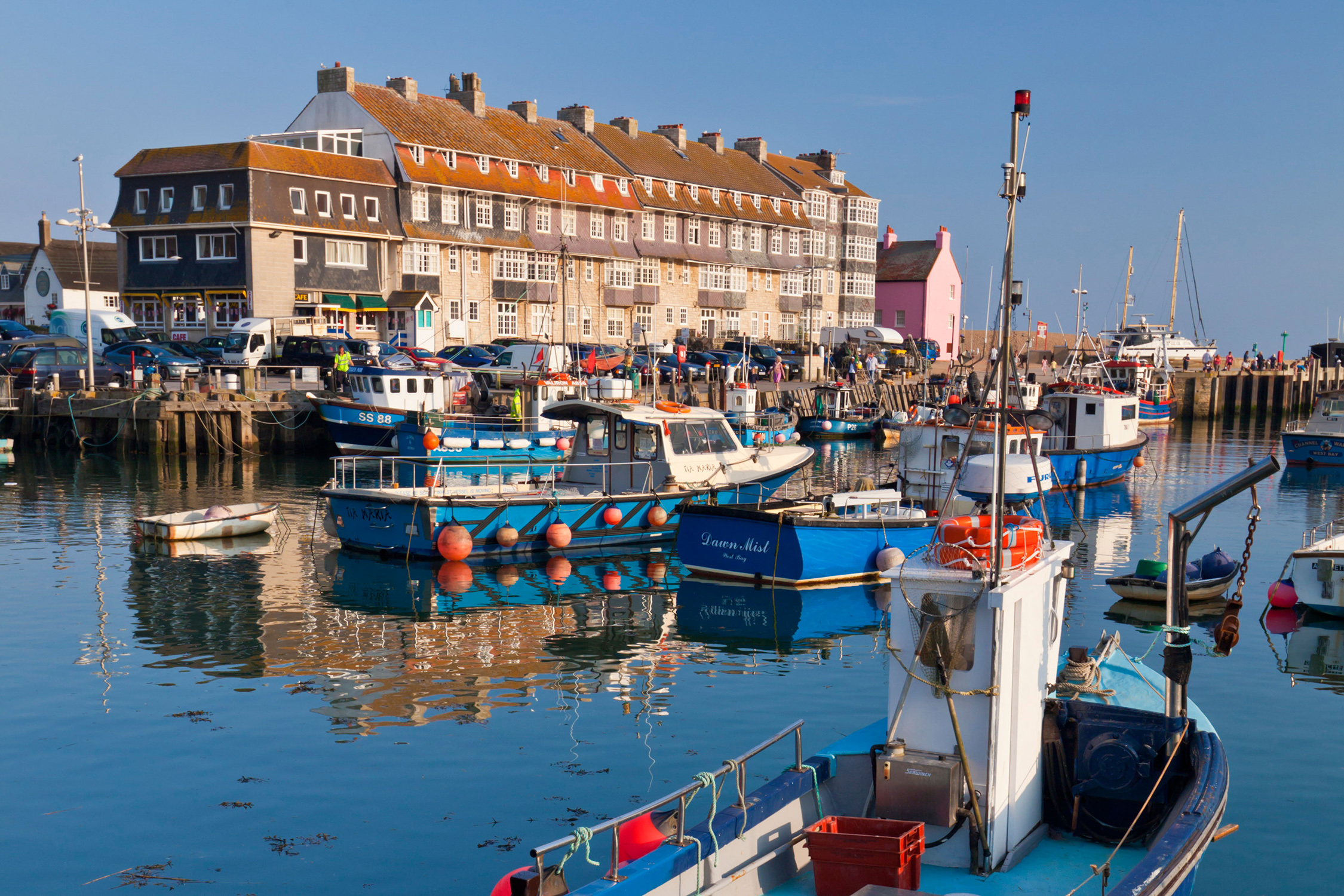 CXBK1T West Bay harbour with yachts and fishing boats, Bridport, gateway town for the Jurassic Coast, Dorset